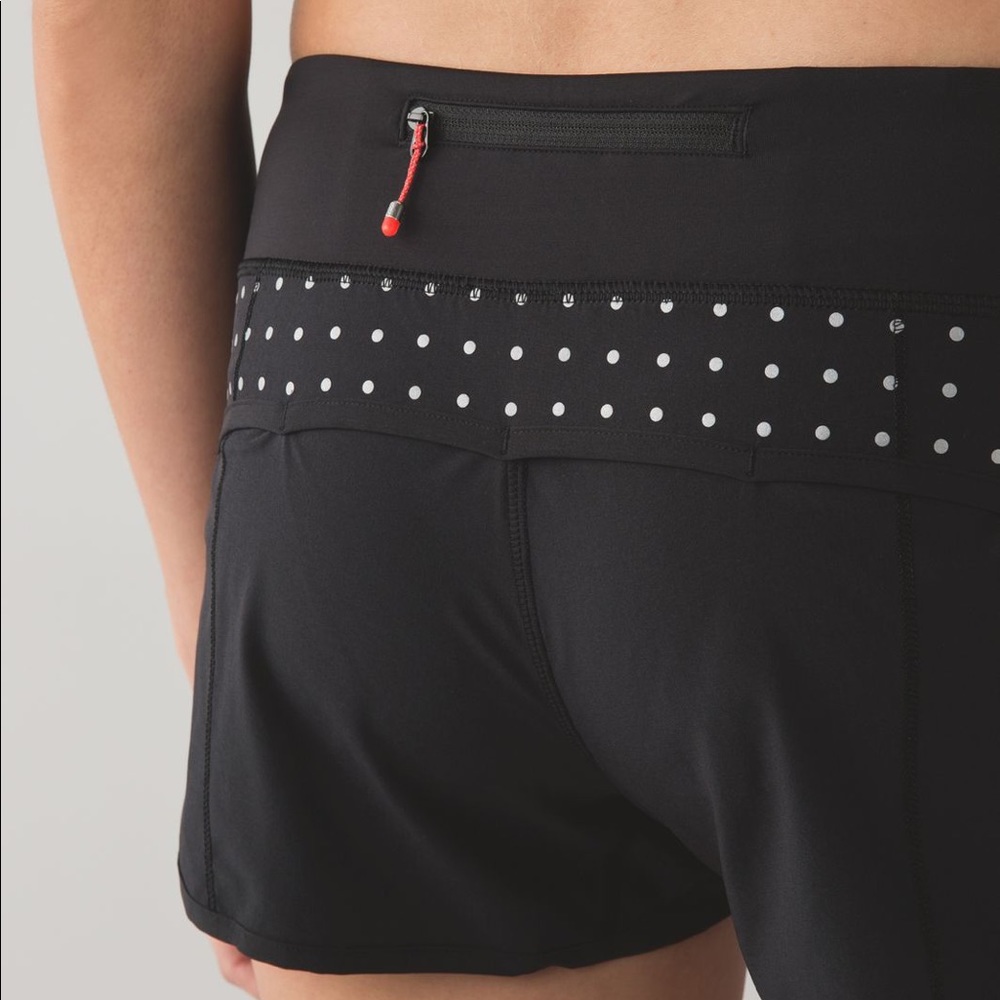 RARE lululemon speed shorts with reflective silver dots, size 8